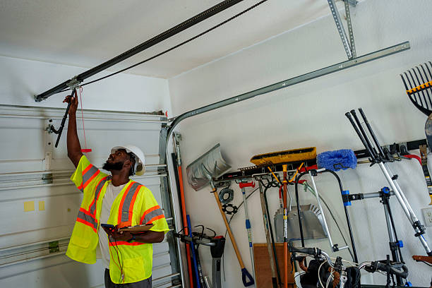 Professional Garage Door Panel Replacement technician working in Claypool Hill, VA